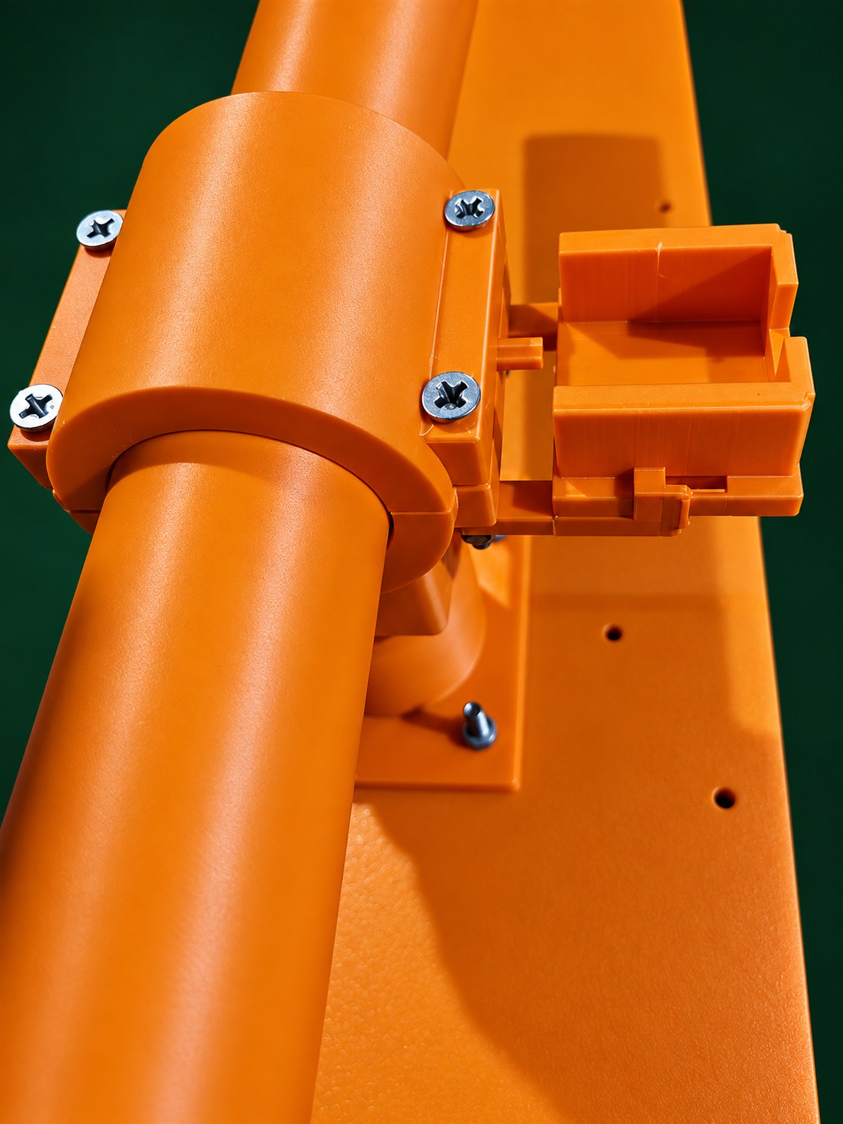 Close-up of a mounting section on a PLA engineering pipeline demonstration model